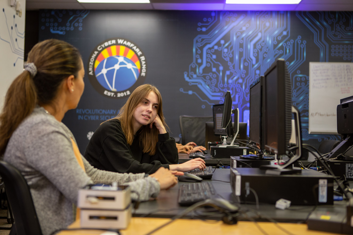 students sitting at computers in cyberwarfare range